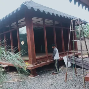 Jasa pembuatan rumah kayu dengan kayu kelapa